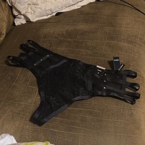 Torrid studs and lace thong size 2